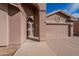 Front entry and garage of a single story house at 6403 S Fairway Dr, Gold Canyon, AZ 85118