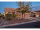 Landscaped yard with gravel and drought-tolerant plants enhances curb appeal at 6403 S Fairway Dr, Gold Canyon, AZ 85118