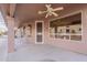 Covered patio with ceiling fan and access to the interior at 6403 S Fairway Dr, Gold Canyon, AZ 85118