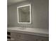 Modern bathroom with chevron tile, floating vanity and large mirror at 6587 N Palmeraie Blvd # 2010, Paradise Valley, AZ 85253