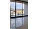 Bright living room with large sliding doors and city views at 6587 N Palmeraie Blvd # 2010, Paradise Valley, AZ 85253