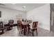 Dining area with a wood table and six chairs at 670 E Wiley Way, Casa Grande, AZ 85122