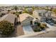 Aerial view of a single-story house with a driveway and landscaping at 7225 W Jones Ave, Phoenix, AZ 85043