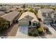 Aerial view of a single-Gathering home with a driveway and landscaping at 7225 W Jones Ave, Phoenix, AZ 85043