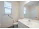 Clean bathroom with white vanity and bathtub at 7225 W Jones Ave, Phoenix, AZ 85043