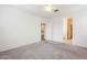 Bright bedroom with carpet flooring and ceiling fan at 7225 W Jones Ave, Phoenix, AZ 85043