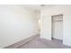 Spacious bedroom with double door closet and carpet flooring at 7225 W Jones Ave, Phoenix, AZ 85043