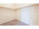 Large walk-in closet with wood shelving at 7225 W Jones Ave, Phoenix, AZ 85043