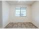 Bright spare bedroom with tile flooring and window blinds at 7225 W Jones Ave, Phoenix, AZ 85043