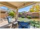 Patio furniture with fire pit and view of backyard at 7325 W Pleasant Oak Way, Florence, AZ 85132