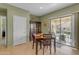 Dining area with sliding door to backyard access at 7325 W Pleasant Oak Way, Florence, AZ 85132