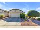 Attached garage with a spacious driveway at 7325 W Pleasant Oak Way, Florence, AZ 85132