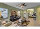 Bright living room with tile floors and comfortable seating at 7325 W Pleasant Oak Way, Florence, AZ 85132