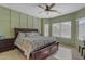 Spacious main bedroom with large windows and ceiling fan at 7325 W Pleasant Oak Way, Florence, AZ 85132