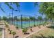 Community tennis courts with surrounding landscaping at 7325 W Pleasant Oak Way, Florence, AZ 85132