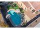 Aerial view of a kidney-shaped pool and backyard at 741 W Harvest Rd, San Tan Valley, AZ 85140