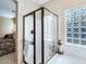 Bathroom with shower and glass enclosure at 741 W Harvest Rd, San Tan Valley, AZ 85140