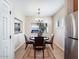 Small dining area with four chairs and chandelier at 741 W Harvest Rd, San Tan Valley, AZ 85140