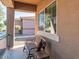 Covered porch with a bench and side yard view at 741 W Harvest Rd, San Tan Valley, AZ 85140