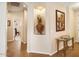 A long hallway with tile floors and decorative wall niches at 741 W Harvest Rd, San Tan Valley, AZ 85140