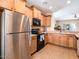 Modern kitchen with stainless steel appliances at 741 W Harvest Rd, San Tan Valley, AZ 85140