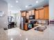 Open concept kitchen with island and stainless steel appliances at 741 W Harvest Rd, San Tan Valley, AZ 85140