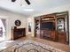 Living room with an entertainment center and comfortable seating at 741 W Harvest Rd, San Tan Valley, AZ 85140