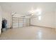 Attached garage with epoxy flooring and ample storage at 7705 E Doubletree Ranch Rd # 39, Scottsdale, AZ 85258