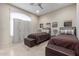 Guest bedroom with two twin beds and a spacious layout at 8687 E Tuckey Ln, Scottsdale, AZ 85250