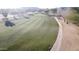 Expansive green golf course with walking path at 8687 E Tuckey Ln, Scottsdale, AZ 85250