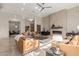 Bright and airy living room with a fireplace and comfortable leather sofas at 8687 E Tuckey Ln, Scottsdale, AZ 85250