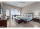 Large main bedroom with a king-size bed and plenty of natural light at 8687 E Tuckey Ln, Scottsdale, AZ 85250