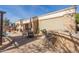 Backyard patio with stone bar and seating at 8687 E Tuckey Ln, Scottsdale, AZ 85250