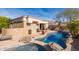 Inviting pool and spa with flagstone patio at 8687 E Tuckey Ln, Scottsdale, AZ 85250