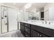 Bathroom with double vanity and a large walk-in shower at 880 E Verde Blvd, Queen Creek, AZ 85140