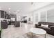 Modern kitchen with dark cabinetry and stainless steel appliances at 880 E Verde Blvd, Queen Creek, AZ 85140