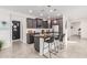 Modern kitchen with granite countertops and island at 880 E Verde Blvd, Queen Creek, AZ 85140