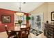 Bright dining room with a wooden table and access to a patio at 8947 E Mescal St, Scottsdale, AZ 85260