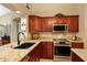 Modern kitchen with granite countertops and ample cabinetry at 8947 E Mescal St, Scottsdale, AZ 85260