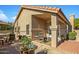 Covered patio with seating area and lush landscaping at 8947 E Mescal St, Scottsdale, AZ 85260