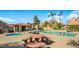 Community pool and spa with ample seating and a covered area at 8947 E Mescal St, Scottsdale, AZ 85260