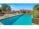 Inviting community pool with lounge chairs and shaded seating at 8947 E Mescal St, Scottsdale, AZ 85260