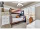 Bedroom with bunk beds and ample storage at 906 N Swan Dr, Gilbert, AZ 85234