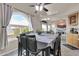 Dining area with a table and chairs, and large window at 906 N Swan Dr, Gilbert, AZ 85234