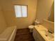 Simple bathroom with shower/tub combo and vanity at 914 N 40Th Ave, Phoenix, AZ 85009