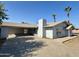 Ranch style home with carport and mature palm trees at 914 N 40Th Ave, Phoenix, AZ 85009