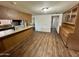 Kitchen with wood cabinets and laminate floors at 914 N 40Th Ave, Phoenix, AZ 85009