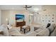 Living room with sectional sofa and wood coffee table at 9230 N 104Th Pl, Scottsdale, AZ 85258