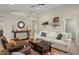 Bright living room with comfortable seating and large windows at 9230 N 104Th Pl, Scottsdale, AZ 85258