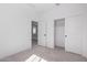 Bedroom featuring a large closet with sliding doors, neutral walls, and carpeted floors at 9350 E Sequence Ave, Mesa, AZ 85212